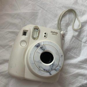 White Polaroid camera